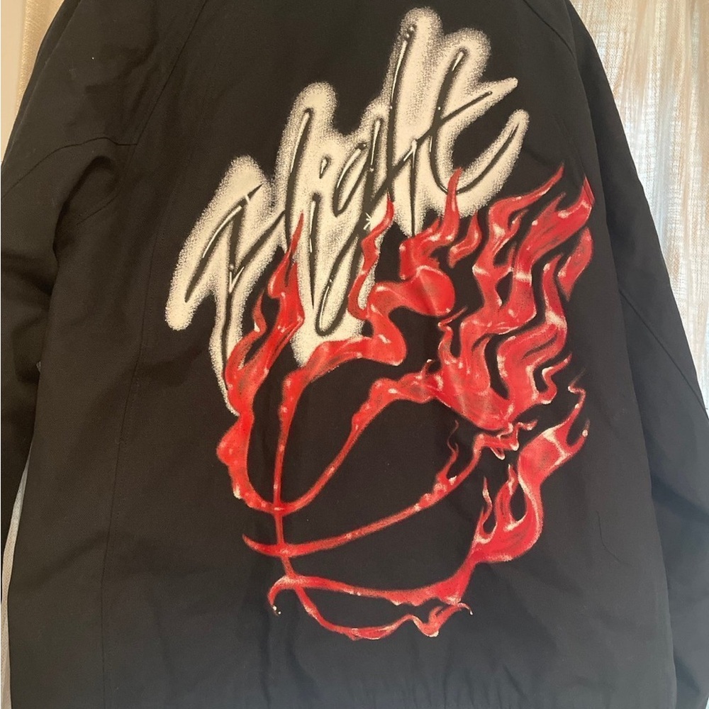 Nike Black Jacket with Red Flame Graphic